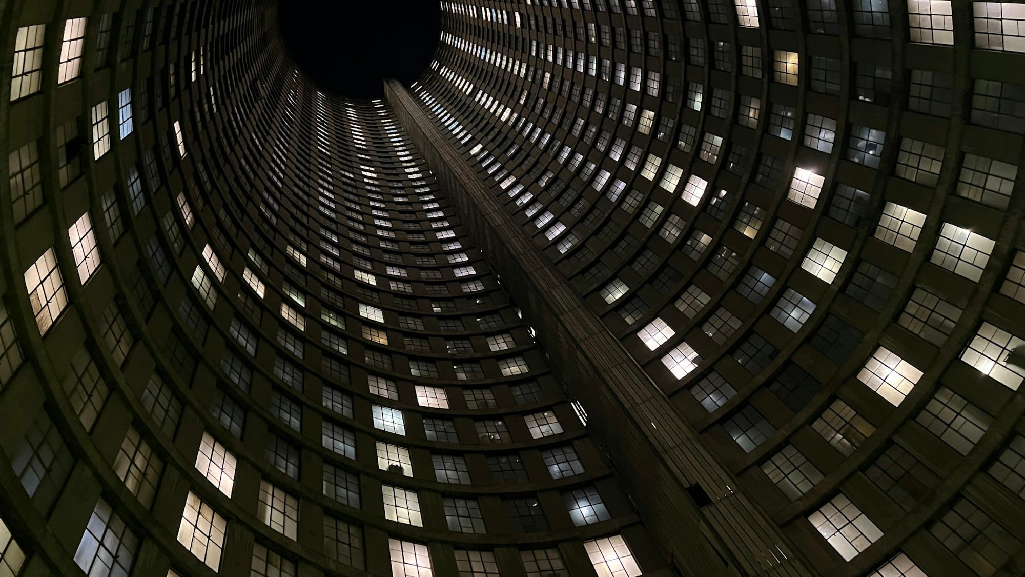 Looking up through the illuminated core of Ponte City, Johannesburg